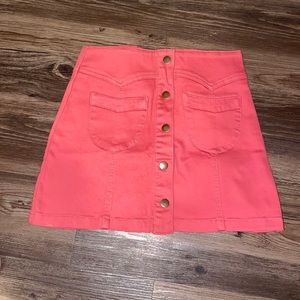 Pink mini skirt with buttons